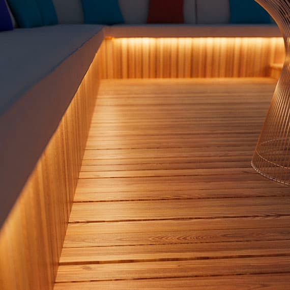 Garden wood decking with solar strip lights